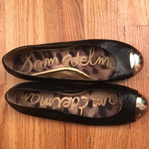 Black snakeskin / gold toe ballet flats